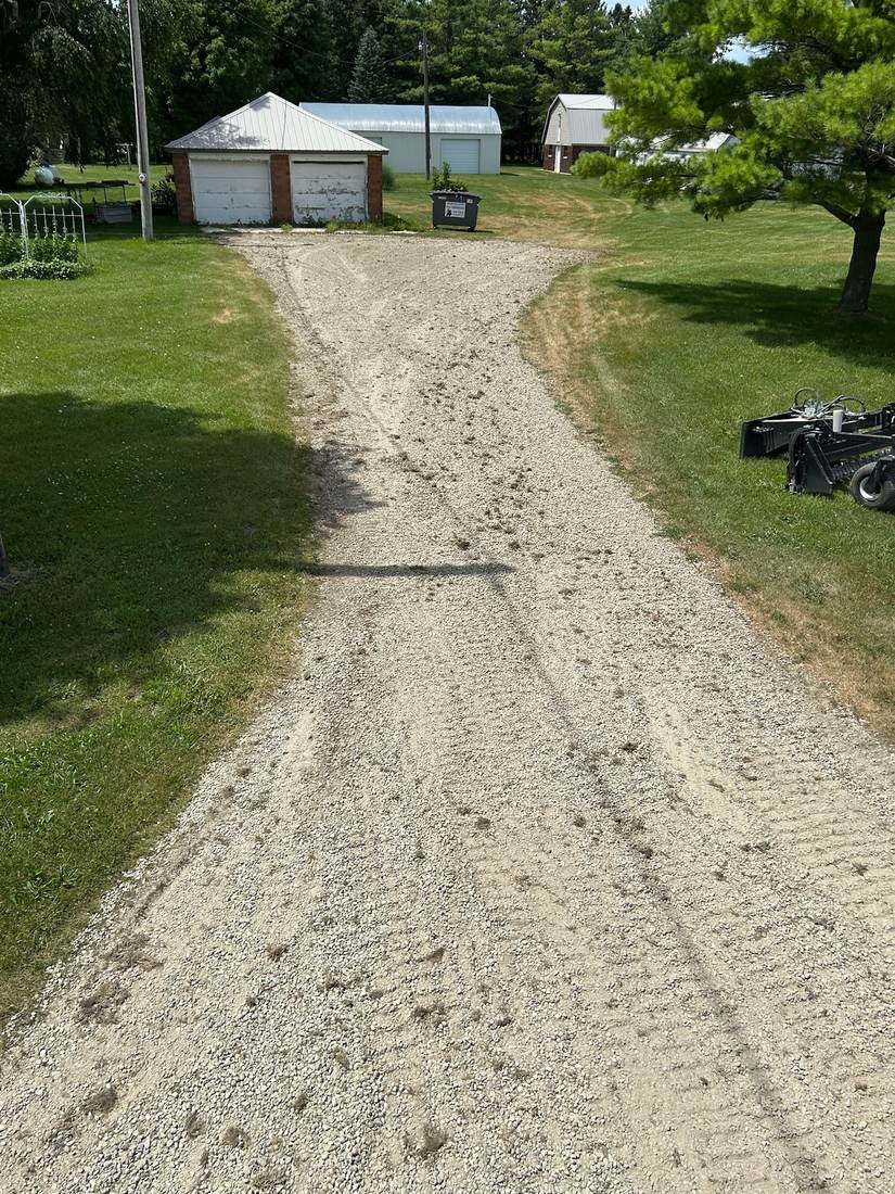 Gravel driveway after revitalization, fresh and even