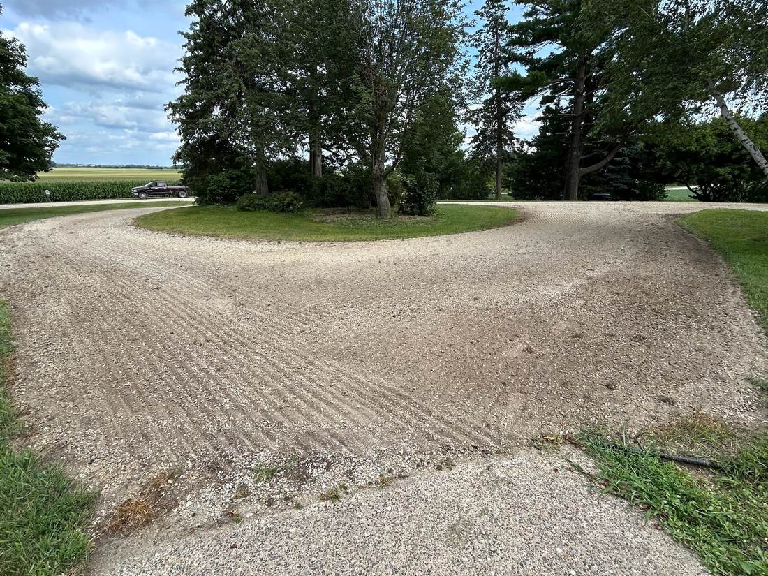 Circular driveway after revitalization, fresh and even, angle two