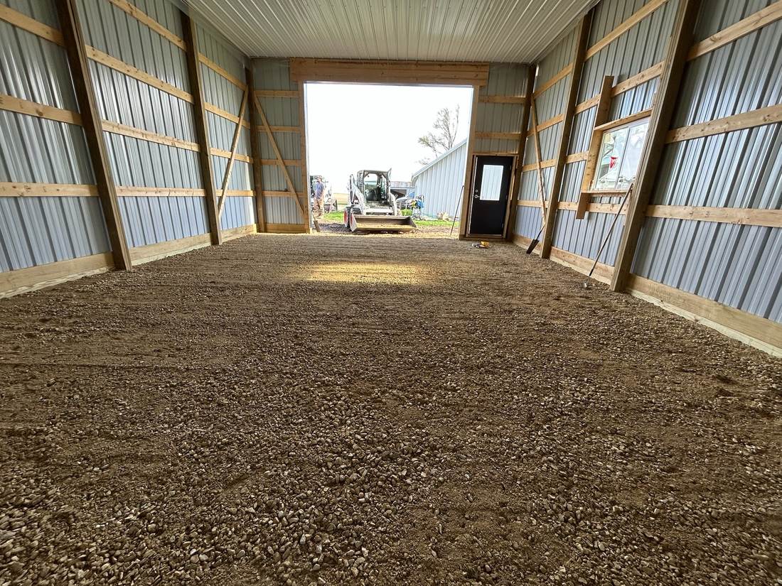 Graded, level gravel floor after grading