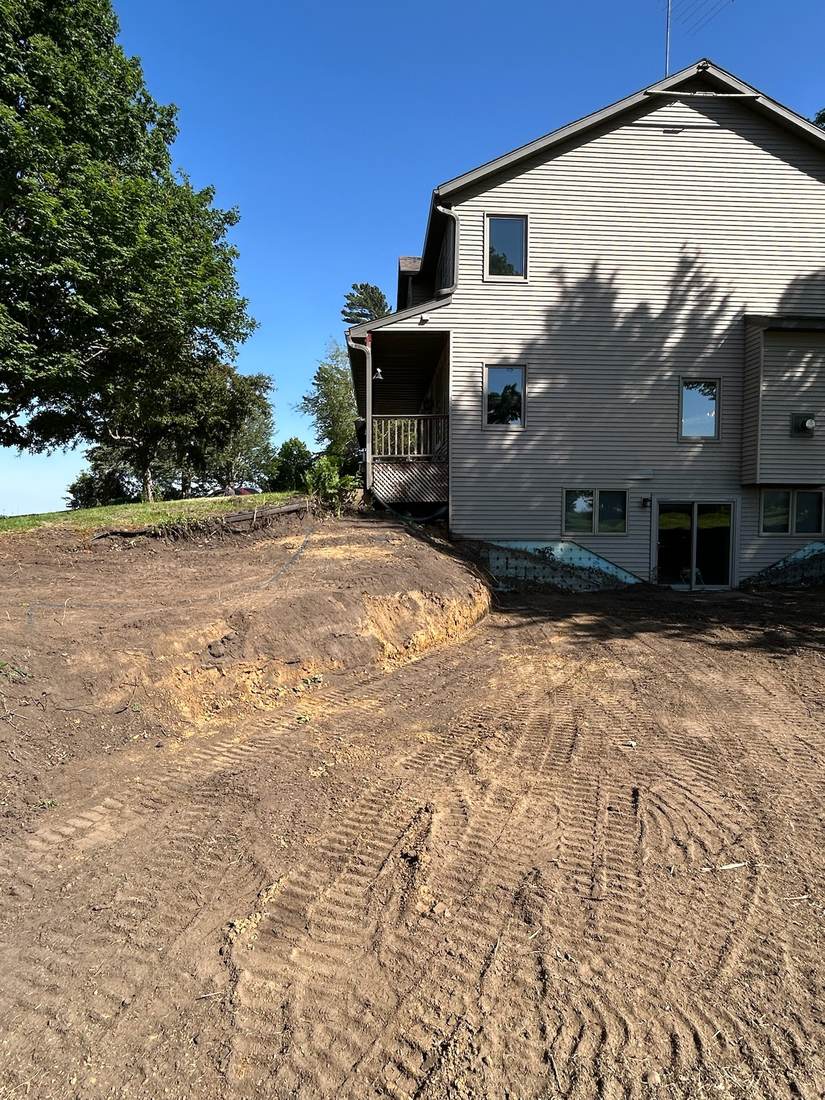 Graded slope next to a house